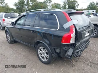 2013 Volvo XC90 Premier Plus with VIN YV4952CZ6D1657803, listed as a IAAI auction lot 40479985 with 211,326 mi miles. Bid and sale history available at carsss.com. Image 3.