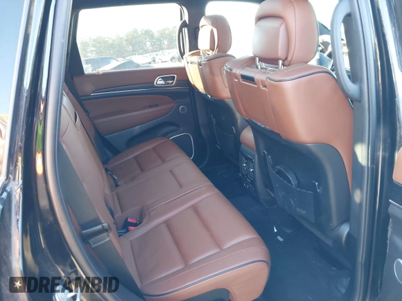 2018 Jeep Grand Cherokee Summit with VIN 1C4RJFJG1JC211047, listed as a IAAI auction lot 41133865 with 66,588 mi miles and . Bid and sale history available at DreamBid. Image 8.