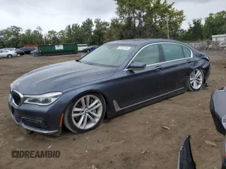 2016 BMW 7 Series 750i with VIN WBA7F0C54GGL99661, listed as a Copart auction lot 71742154 with 104,498 mi miles and Salvage Title. Bid and sale history available at carsss.com. Image 1.