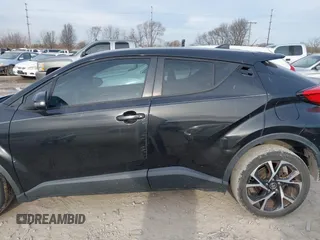 2018 Toyota C-HR XLE with VIN NMTKHMBX9JR001731, listed as a IAAI auction lot 41835918 with 138,087 mi miles. Bid and sale history available at carsss.com. Image 14.