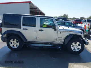 2010 Jeep Wrangler Unlimited Sport with VIN 1J4BA3H17AL211887, listed as a IAAI auction lot 41778324 with 185,626 mi miles. Bid and sale history available at carsss.com. Image 13.