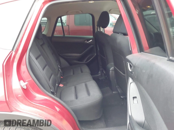 2015 Mazda CX-5 Touring with VIN JM3KE4CYXF0439953, listed as a IAAI auction lot 42124197 with 242,614 mi miles and . Bid and sale history available at DreamBid. Image 8.