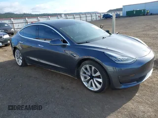 2020 Tesla Model 3 Long Range with VIN 5YJ3E1EB3LF801834, listed as a IAAI auction lot 42015079 with 47,793 mi miles. Bid and sale history available at carsss.com. Image 1.