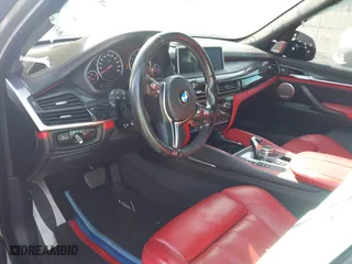 2016 BMW X5 M with VIN 5YMKT6C51G0R79331, listed as a IAAI auction lot 40590865 with 80,772 mi miles. Bid and sale history available at carsss.com. Image 5.