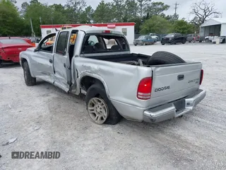 2003 Dodge Dakota SLT with VIN 1D7HL48N13S274856, listed as a IAAI auction lot 41954038 with 306,728 mi miles. Bid and sale history available at carsss.com. Image 3.