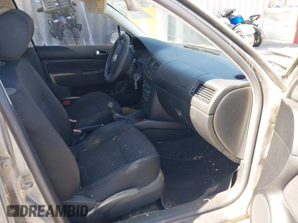 2003 Volkswagen Jetta GL z VIN 3VWRK69M43M117878, wystawiony jako IAAI lot #42553211 z przebiegiem 183 524 mil mil oraz . Historia ofert i sprzedaży dostępna na DreamBid. Obrazek 5.
