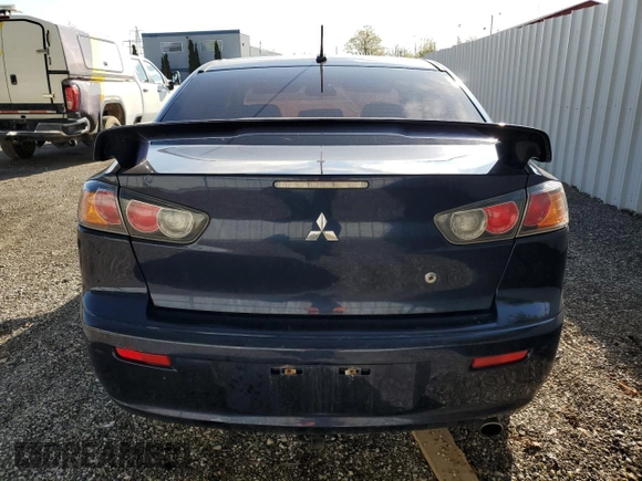 2014 Mitsubishi Lancer SE z VIN JA32V2FW2EU605184, wystawiony jako Copart lot #56007575 z przebiegiem 234 213 mil mil oraz Szkoda całkowita • Salvage title. Historia ofert i sprzedaży dostępna na DreamBid. Obrazek 6.