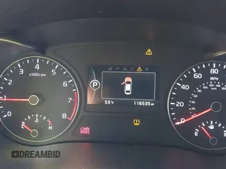 2016 Kia Optima SX Turbo with VIN 5XXGW4L2XGG084628, listed as a IAAI auction lot 41668592 with 116,535 mi miles and . Bid and sale history available at carsss.com. Image 7.