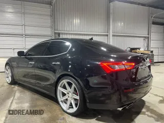 2014 Maserati Ghibli S Q4 z VIN ZAM57RTA9E1112724, wystawiony jako Copart lot #73739204 z przebiegiem 45 525 mil mil oraz Szkoda całkowita • Salvage title. Historia ofert i sprzedaży dostępna na DreamBid. Obrazek 3.