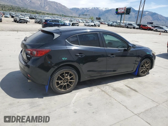 2014 Mazda 3 i Touring with VIN JM1BM1L74E1148214, listed as a Copart auction lot 54272605 with 158,278 mi miles and Salvage title. Bid and sale history available at DreamBid. Image 3.