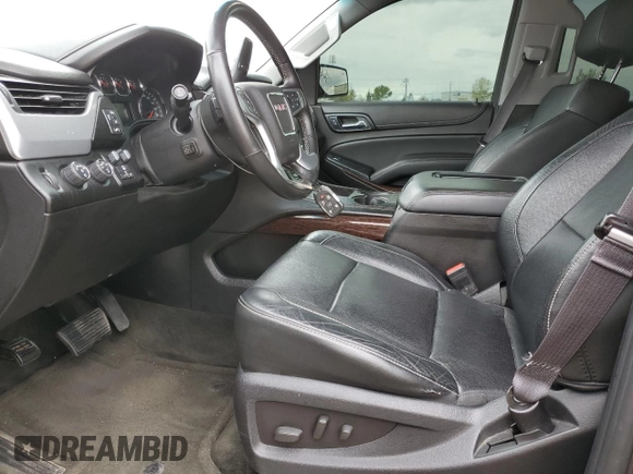 2015 GMC Yukon SLT z VIN 1GKS2BKCXFR269881, wystawiony jako Copart lot #57678175 z przebiegiem 256 703 mil mil oraz Czysty tytuł • Clean title. Historia ofert i sprzedaży dostępna na DreamBid. Obrazek 7.
