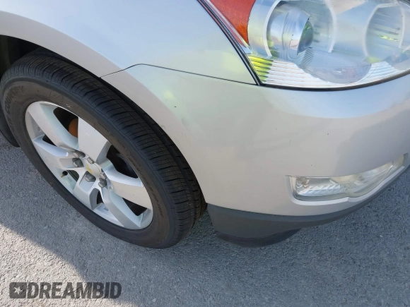 2011 Chevrolet Traverse LTZ with VIN 1GNKVLEDXBJ250325, listed as a IAAI auction lot 42107708 with 203,439 mi miles and . Bid and sale history available at DreamBid. Image 6.