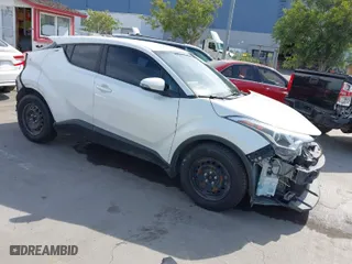 2018 Toyota C-HR XLE with VIN NMTKHMBX4JR049041, listed as a IAAI auction lot 42038397 with 74,930 mi miles. Bid and sale history available at carsss.com. Image 1.