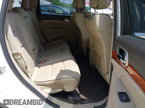 2011 Jeep Grand Cherokee Overland with VIN 1J4RR6GG3BC587857, listed as a IAAI auction lot 42879845 with 165,572 mi miles and . Bid and sale history available at DreamBid. Image 8.