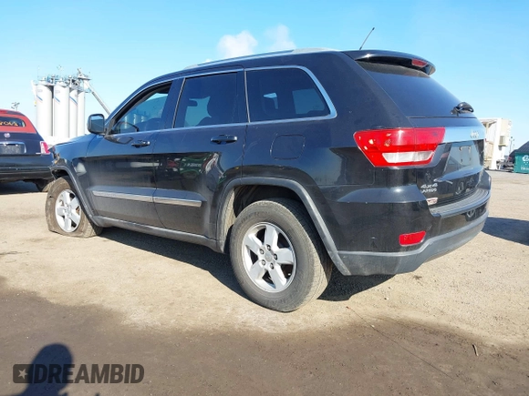 2012 Jeep Grand Cherokee Laredo with VIN 1C4RJFAG5CC118826, listed as a IAAI auction lot 42039801 with 158,153 mi miles. Bid and sale history available at carsss.com. Image 3.
