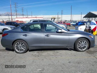 2021 Infiniti Q50 Luxe z VIN JN1EV7BP3MM701871, wystawiony jako IAAI lot #41383333 z przebiegiem 28 634 mil mil oraz . Historia ofert i sprzedaży dostępna na DreamBid. Obrazek 14.