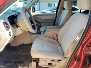 2007 Ford Explorer Sport Trac XLT with VIN 1FMEU51887UA09474, listed as a Copart auction lot 57625115 with 128,443 mi miles and Salvage title. Bid and sale history available at DreamBid. Image 7.