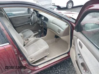 2000 Nissan Altima XE with VIN 1N4DL01D1YC189431, listed as a IAAI auction lot 41502056 with 215,958 mi miles. Bid and sale history available at carsss.com. Image 5.