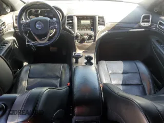 2014 Jeep Grand Cherokee Overland with VIN 1C4RJFCG0EC542527, listed as a Copart auction lot 51776655 with 167,703 mi miles and Salvage Title. Bid and sale history available at DreamBid. Image 8.