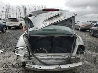 2006 Nissan Sentra S z VIN 3N1CB51D56L552226, wystawiony jako Copart lot #50410625 z przebiegiem 210 985 mil mil oraz Szkoda całkowita • Salvage title. Historia ofert i sprzedaży dostępna na DreamBid. Obrazek 6.