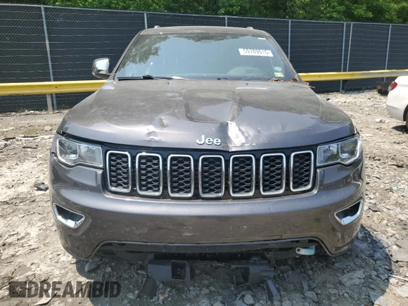 2018 Jeep Grand Cherokee Limited with VIN 1C4RJEBG6JC247468, listed as a Copart auction lot 59789015 with 84,005 mi miles and Salvage title. Bid and sale history available at DreamBid. Image 5.