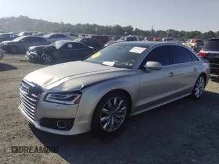 2017 Audi A8 with VIN WAU44AFD3HN014802, listed as a IAAI auction lot 42573537 with 121,096 mi miles and . Bid and sale history available at DreamBid. Image 17.