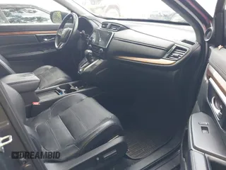 2018 Honda CR-V Touring z VIN 7FARW1H9XJE040530, wystawiony jako IAAI lot #42227446 z przebiegiem 101 299 mil mil oraz . Historia ofert i sprzedaży dostępna na DreamBid. Obrazek 5.