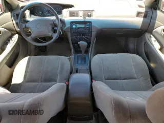 1998 Toyota Camry LE z VIN 4T1BG28K6WU308356, wystawiony jako Copart lot #57686475 z przebiegiem 178 274 mil mil oraz Szkoda całkowita • Salvage title. Historia ofert i sprzedaży dostępna na DreamBid. Obrazek 8.