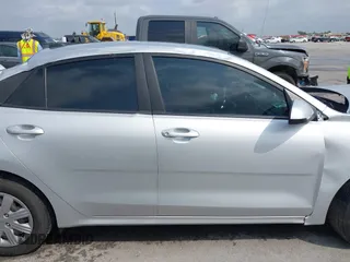 2023 Kia Rio S z VIN 3KPA24AD8PE530662, wystawiony jako IAAI lot #42109727 z przebiegiem 34 948 mil mil oraz . Historia ofert i sprzedaży dostępna na DreamBid. Obrazek 14.