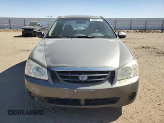 2006 Kia Spectra EX with VIN KNAFE122X65277053, listed as a Copart auction lot 75697314 with 147,156 mi miles and Salvage Title. Bid and sale history available at carsss.com. Image 5.