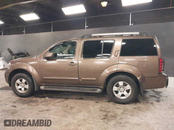 2005 Nissan Pathfinder SE z VIN 5N1AR18W65C703936, wystawiony jako IAAI lot #41271670 z przebiegiem 129 744 mil mil oraz . Historia ofert i sprzedaży dostępna na DreamBid. Obrazek 14.