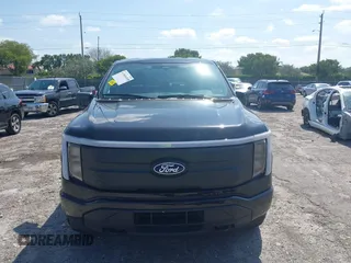 2024 Ford F-150 Lightning XLT with VIN 1FTVW3LK8RWG20320, listed as a IAAI auction lot 41960103 with Not provided miles and . Bid and sale history available at DreamBid. Image 6.