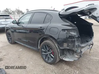 2019 Alfa Romeo Stelvio Ti z VIN ZASPAKBNXK7C44188, wystawiony jako IAAI lot #41320657 z przebiegiem 89 927 mil mil oraz . Historia ofert i sprzedaży dostępna na DreamBid. Obrazek 3.