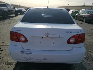 2003 Toyota Corolla CE with VIN 1NXBR32EX3Z057713, listed as a Copart auction lot 85710344 with 188,478 mi miles and Salvage Title. Bid and sale history available at DreamBid. Image 6.