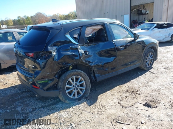 2022 Mazda CX-5 2.5 S Preferred Package with VIN JM3KFBCM9N1594016, listed as a IAAI auction lot 40931444 with 29,515 mi miles. Bid and sale history available at carsss.com. Image 4.