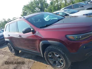 2019 Jeep Cherokee Trailhawk with VIN 1C4PJMBX5KD421043, listed as a IAAI auction lot 42570336 with 114,463 mi miles and . Bid and sale history available at DreamBid. Image 12.