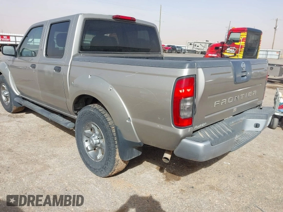 2004 Nissan Frontier XE z VIN 1N6ED27T54C427374, wystawiony jako IAAI lot #41712499 z przebiegiem 218 902 mil mil oraz . Historia ofert i sprzedaży dostępna na DreamBid. Obrazek 3.