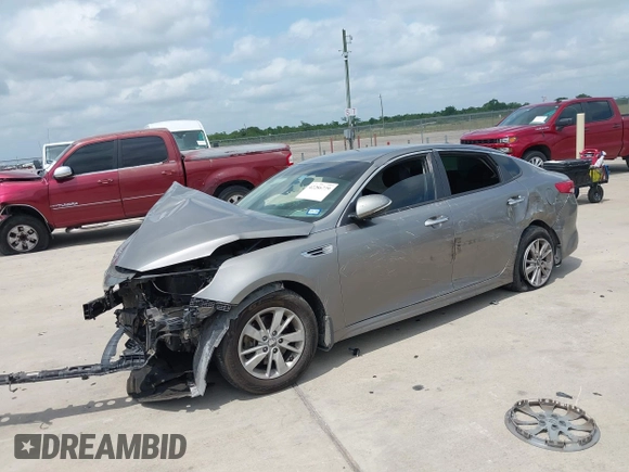 2018 Kia Optima LX with VIN 5XXGT4L38JG237631, listed as a IAAI auction lot 42286779 with 156,471 mi miles and . Bid and sale history available at DreamBid. Image 2.