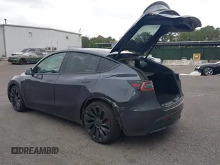 2022 Tesla Model Y Performance z VIN 7SAYGDEF5NF544542, wystawiony jako IAAI lot #42118855 z przebiegiem 27 256 mil mil oraz . Historia ofert i sprzedaży dostępna na DreamBid. Obrazek 3.