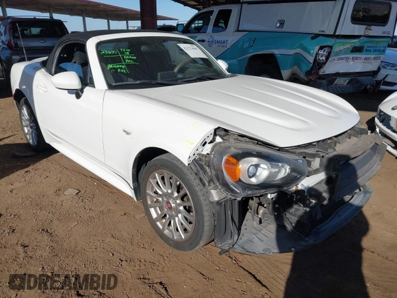 2018 FIAT 124 Spider Abarth z VIN JC1NFAEK9J0137571, wystawiony jako IAAI lot #42333604 z przebiegiem 31 532 mil mil oraz . Historia ofert i sprzedaży dostępna na DreamBid. Obrazek 1.