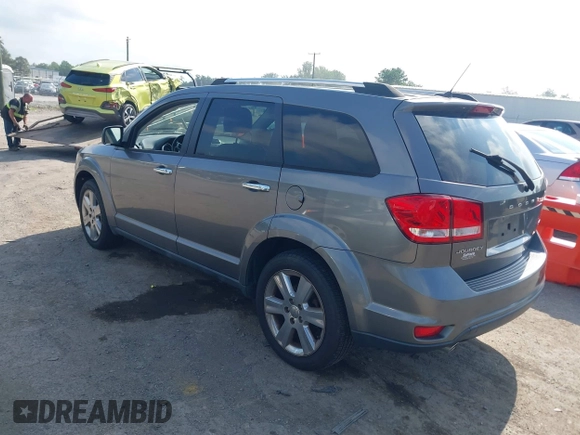 2012 Dodge Journey Crew with VIN 3C4PDCDG9CT199567, listed as a IAAI auction lot 42738030 with 140,864 mi miles and . Bid and sale history available at DreamBid. Image 3.