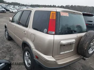 2000 Honda CR-V SE with VIN JHLRD1877YS023555, listed as a IAAI auction lot 41625009 with 164,000 mi miles. Bid and sale history available at carsss.com. Image 3.