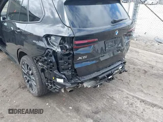 2025 BMW X5 xDrive40i with VIN 5UX23EU03S9Z21861, listed as a IAAI auction lot 41852928 with 992 mi miles and . Bid and sale history available at DreamBid. Image 6.