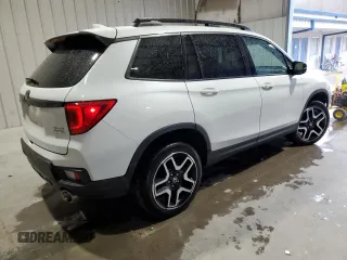 2022 Honda Passport Elite with VIN 5FNYF8H05NB004199, listed as a Copart auction lot 48521594 with 23,913 mi miles. Bid and sale history available at carsss.com. Image 3.