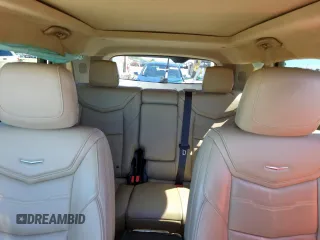 2017 Cadillac XT5 Platinum AWD z VIN 1GYKNFRS0HZ111747, wystawiony jako Copart lot #57666415 z przebiegiem 72 632 mil mil oraz Szkody całkowita. Historia ofert i sprzedaży dostępna na DreamBid. Obrazek 10.