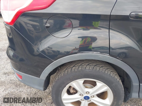 2014 Ford Escape SE with VIN 1FMCU9GX2EUB68419, listed as a IAAI auction lot 42741491 with Not provided miles and . Bid and sale history available at DreamBid. Image 13.