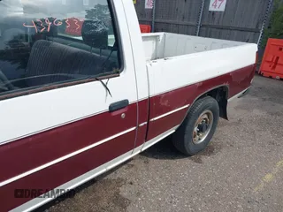 1991 Nissan Frontier XE with VIN 1N6SD11SXMC410552, listed as a IAAI auction lot 42439633 with 137,350 mi miles and . Bid and sale history available at DreamBid. Image 6.