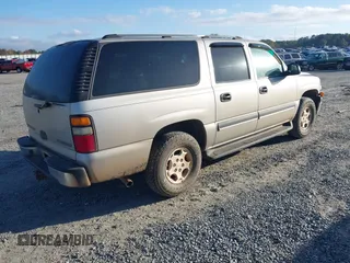2004 Chevrolet Suburban LS with VIN 3GNEC16Z94G115374, listed as a IAAI auction lot 41125805 with 91,176 mi miles. Bid and sale history available at carsss.com. Image 4.