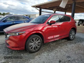 2023 Mazda CX-5 Signature with VIN JM3KFBXY4P0100652, listed as a Copart auction lot 82235664 with 29,344 mi miles and Salvage Title. Bid and sale history available at carsss.com. Image 1.