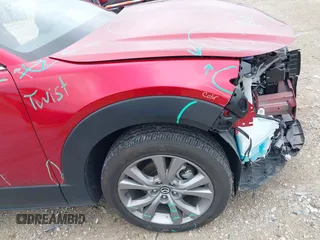 2023 Mazda CX-30 S Premium with VIN 3MVDMBDM3PM511402, listed as a IAAI auction lot 42180001 with 6,189 mi miles and . Bid and sale history available at DreamBid. Image 19.